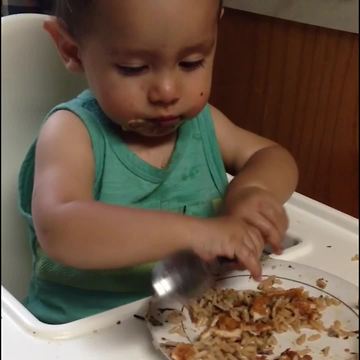 Adorable Little Boy Fails in Using a Spoon