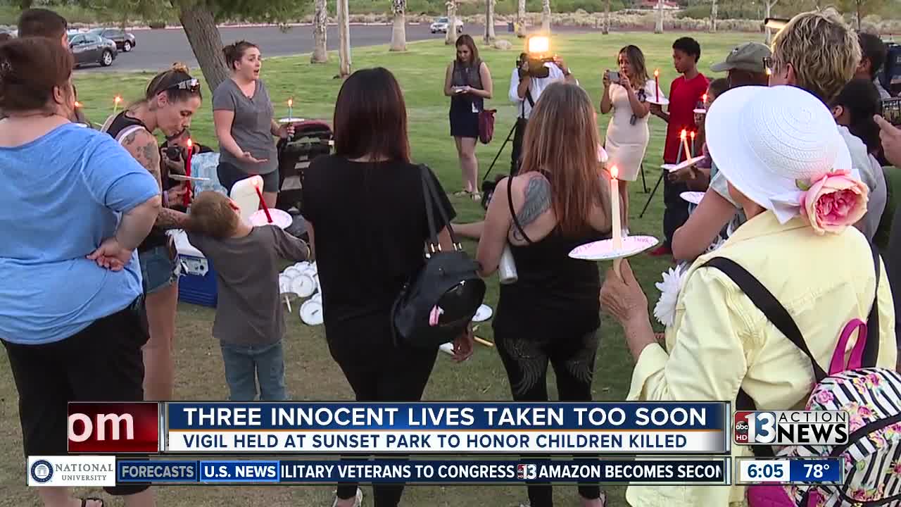 Candlelight vigil at park for 3 dead children