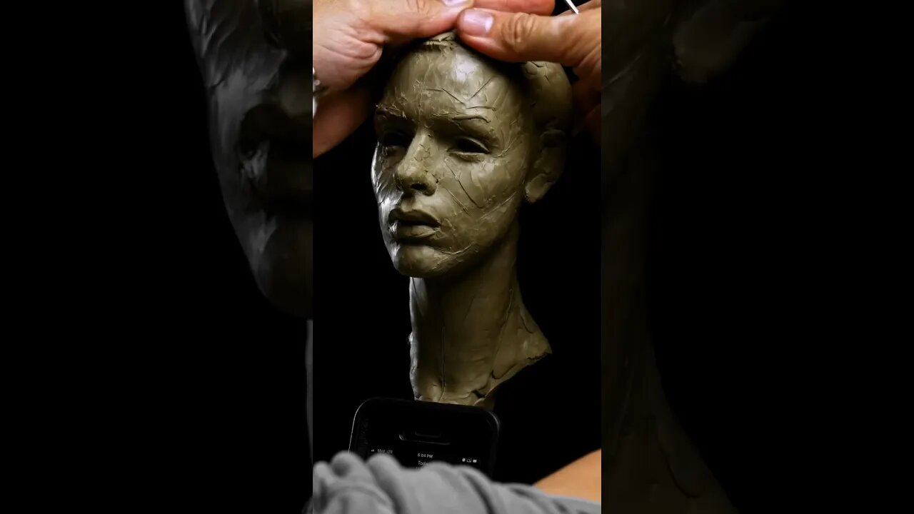 Sculpting female portrait excerpt.