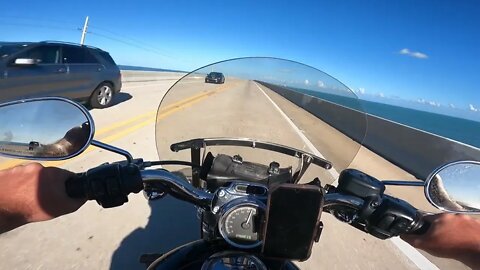 riding my motorcycle over the 7mile bridge from the keys