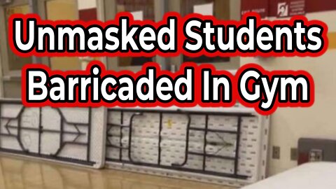 Unmasked students barricaded in freezing school gym.