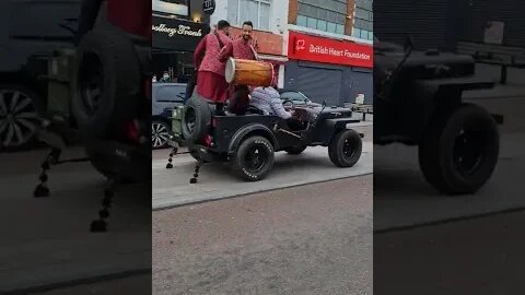 Filming video at Southall Broadway London UK