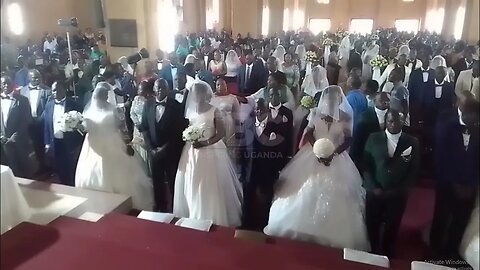 Mass wedding - Luwarira weds 33 couples at Namirembe