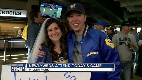 Newlyweds celebrate "honeymoon" at Miller Park