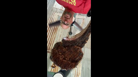 Just Pulling a Tomahawk Ribeye off my Grill