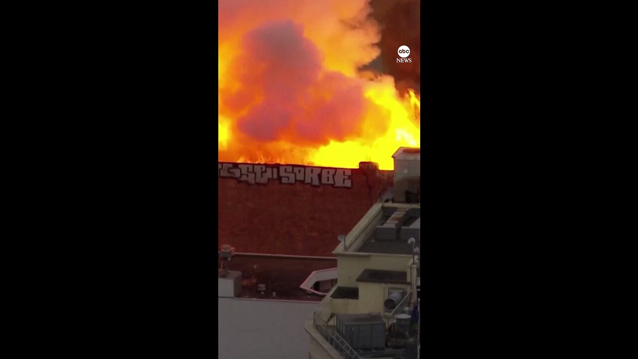 INFERNO: Firefighters are battling a huge blaze that has engulfed a multi-story building