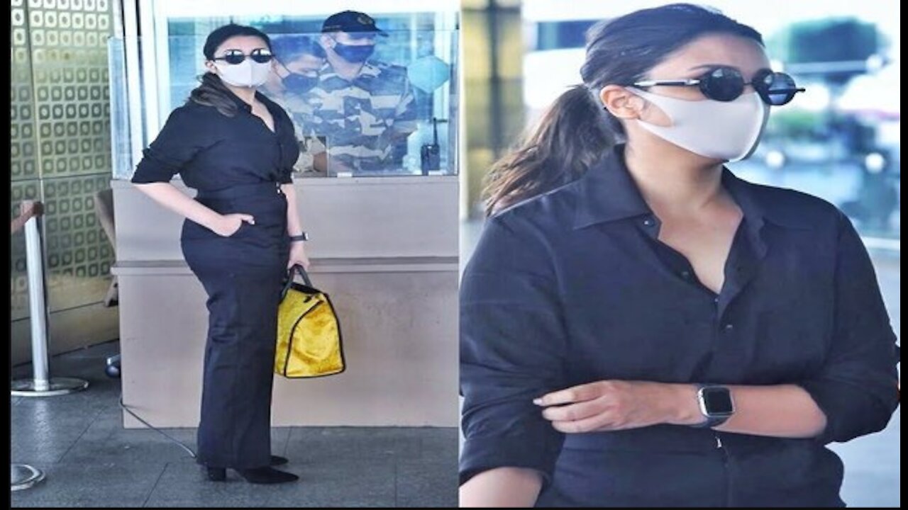 Parineeti Chopra pose for photos at Airport