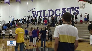 Students climb bleachers to honor 9/11 firefighters