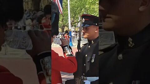 Holding his gun as he drinks water rehearsal trooping the colour #themall