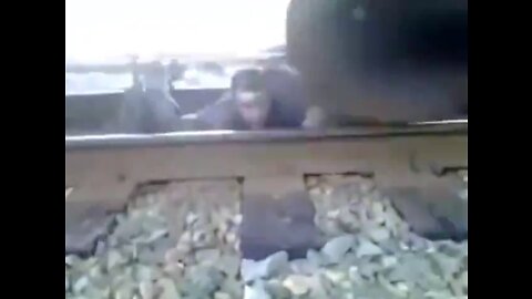 Hanging out under a moving train - Insanity