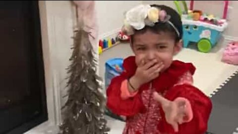 Toddler horrified by arrival Santa on Christmas Eve