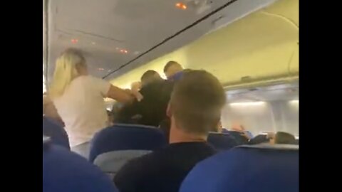 Crazy fight on an aeroplane