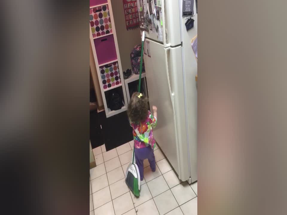 Adorable Girl Won't let Height Keep her from Magnets!