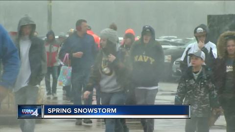 Spring snow makes tailgates, driving more difficult