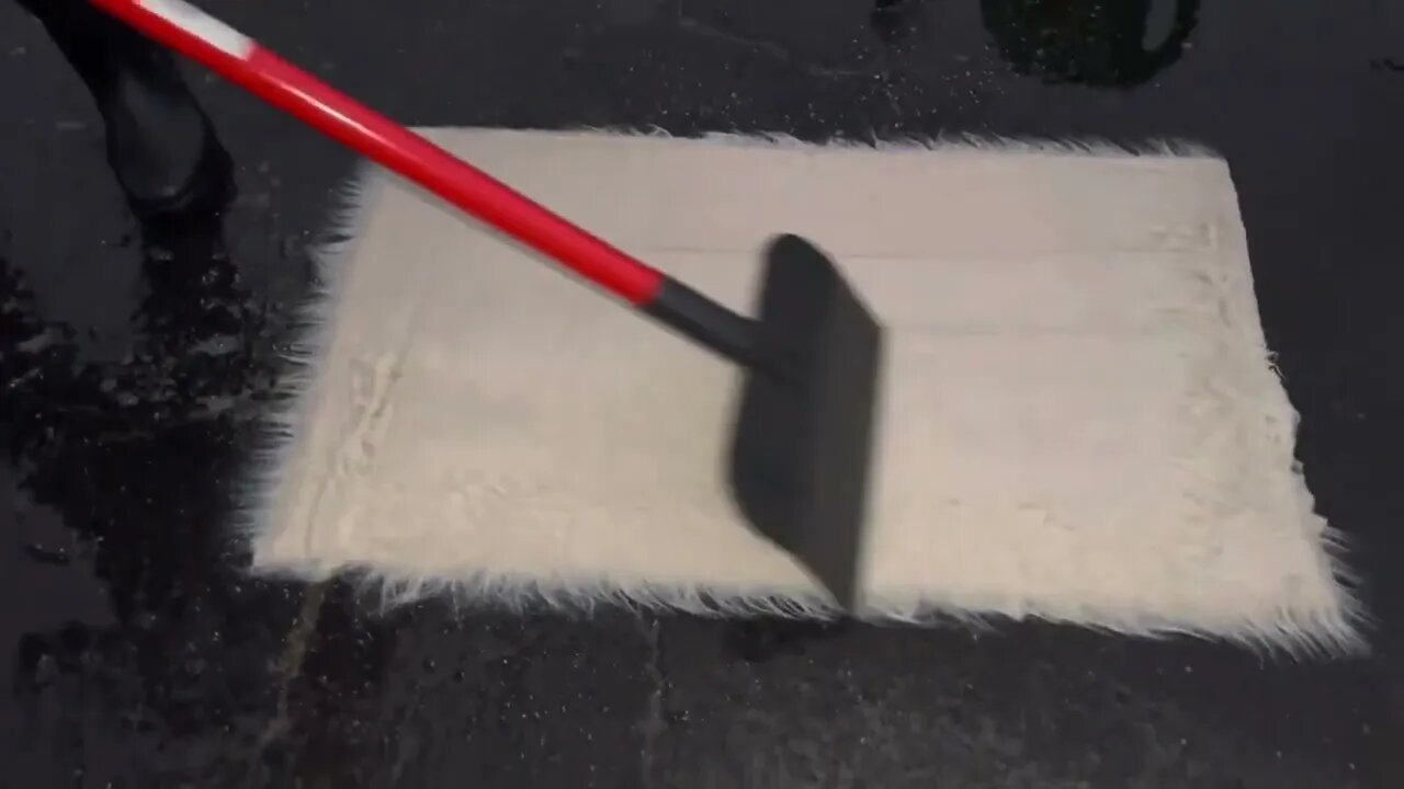 Oddly satisfying ASMR video of a fluffy white rug being washed. Carpet scraping, brushing, scrubbing