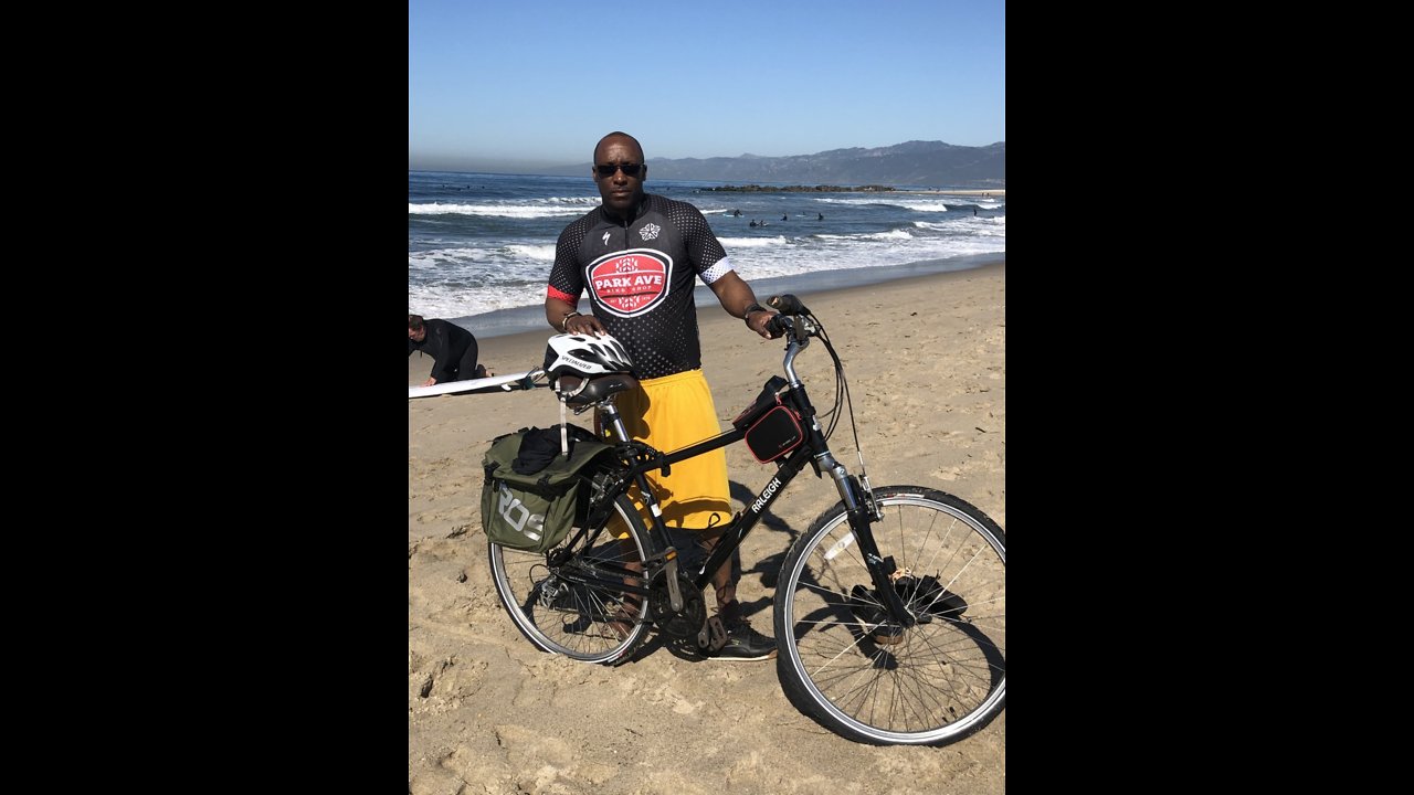 Man rides his bike from LA to NYC to raise scholarship funds, help disadvantaged students