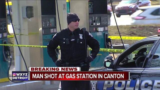 Man shot at Canton gas station; suspected shooter in custody