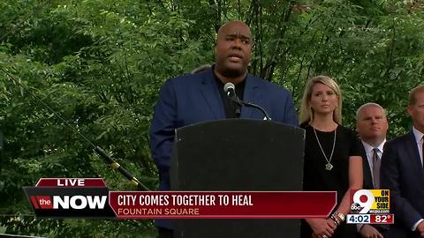 United Way CEO Michael Johnson speaks at Fountain Square vigil