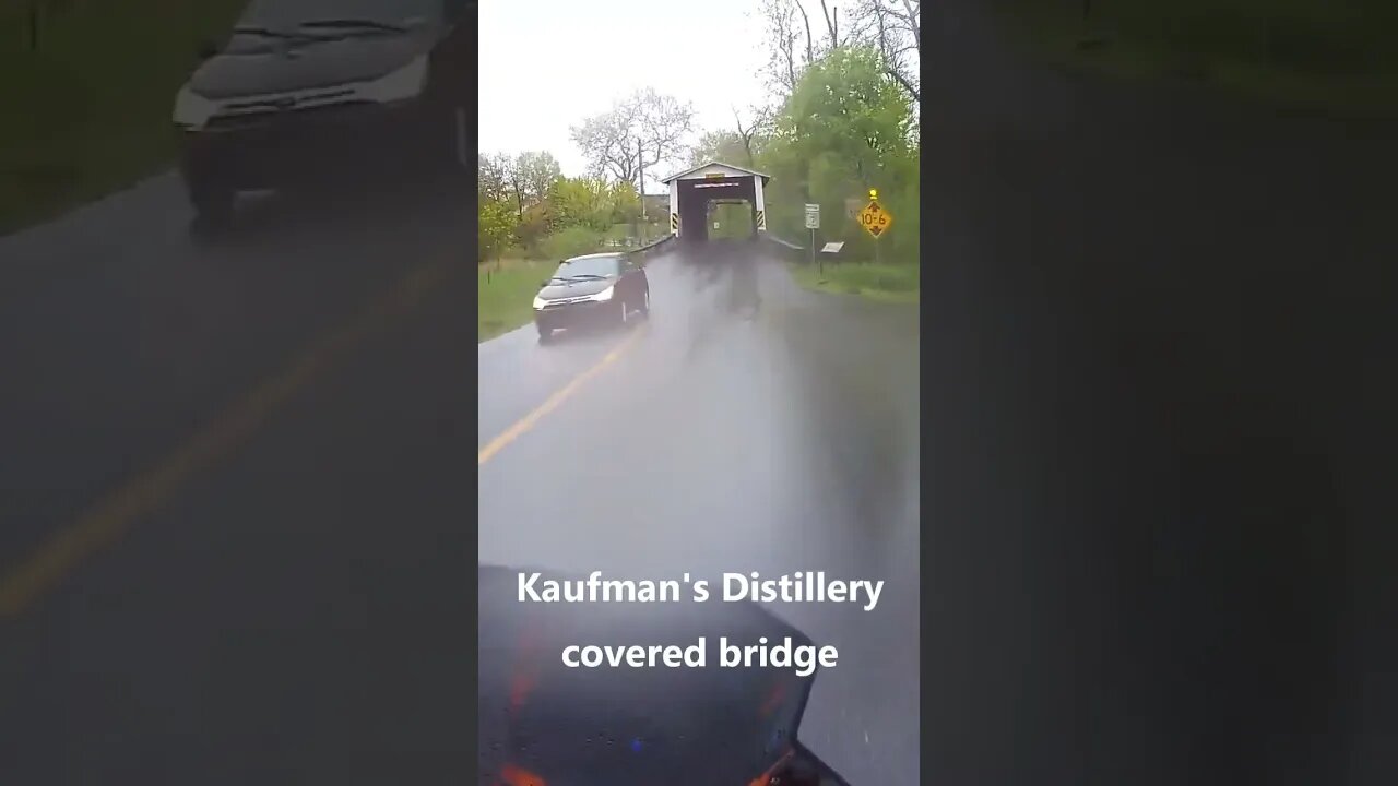 An inattentive driver pulls out in front of me, and I cross a covered bridge