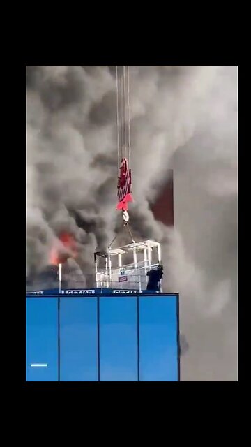 Crane operator saves worker from deadly fire