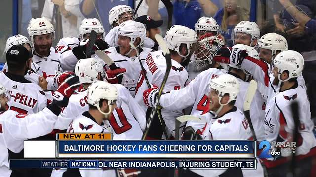 Baltimore hockey fans cheering for Capitals in Stanley Cup Final