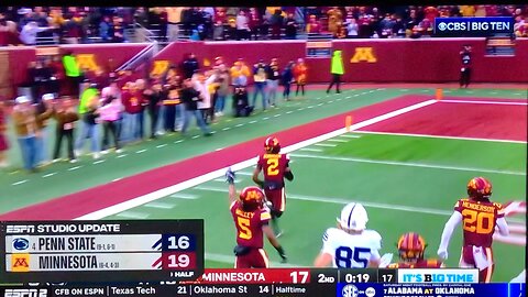 Gophers DB #2 Ethan Robinson returns blocked extra point attempt for 2 pts.