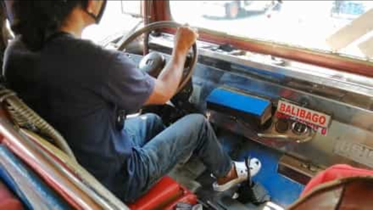 Jeepney driver only uses feet to shift