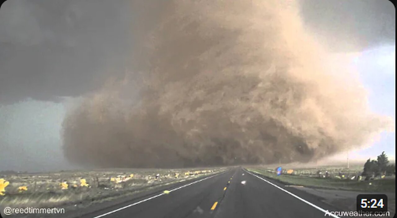 Guy Drives Through a TORNADO!!!