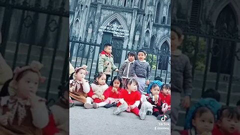 Beautiful Hànoi Children In Front Of St Joseph Cathedral