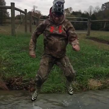 Funny Kid Jumps And Falls Into Water