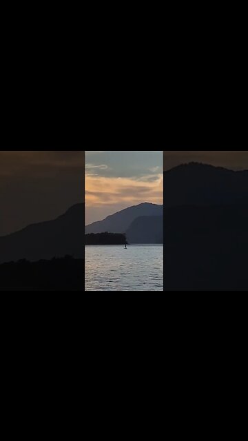 Man walking on water? Man standing on ufo? Surfer without wave or wind hovering above the water?