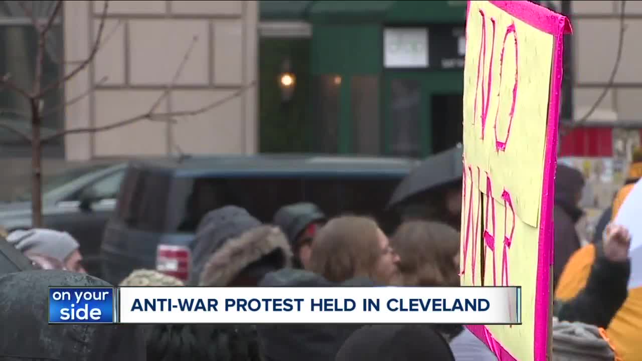 Protestors in Market Square condemning conflicts with Iran