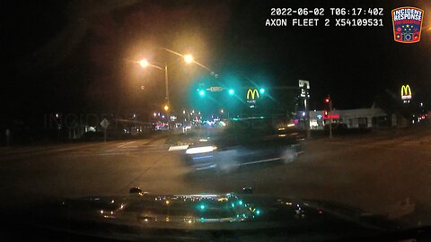 Dash Cam: Red Light Runner Almost Hits Milwaukee Police Officers