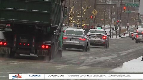 Snow and rain coming down in Baltimore City