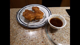 Cooking w/Sherrie Butterflied Chicken filets w/ spicy honey sauce on a bed of cabbage