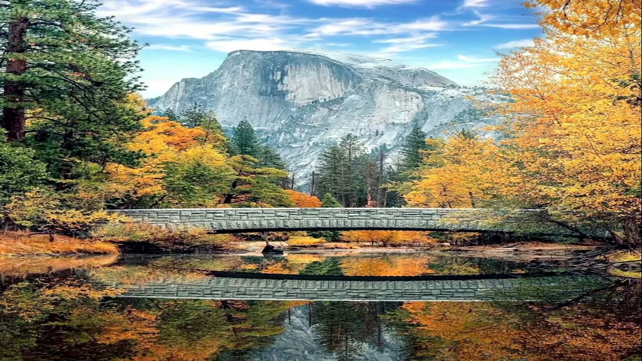 Autumn Landscape Showcased By A View Of Scenic Mountains And Bridge Along With Relaxing Piano Music.