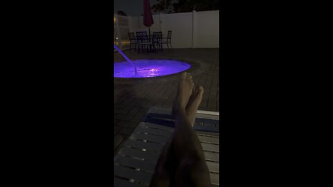 Relaxing by the pool