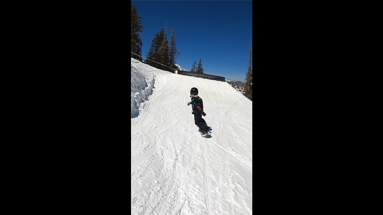 8year old!!! Shreding on a Snowboard!