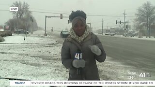 Rae Daniel checks out road conditions in Lees Summit