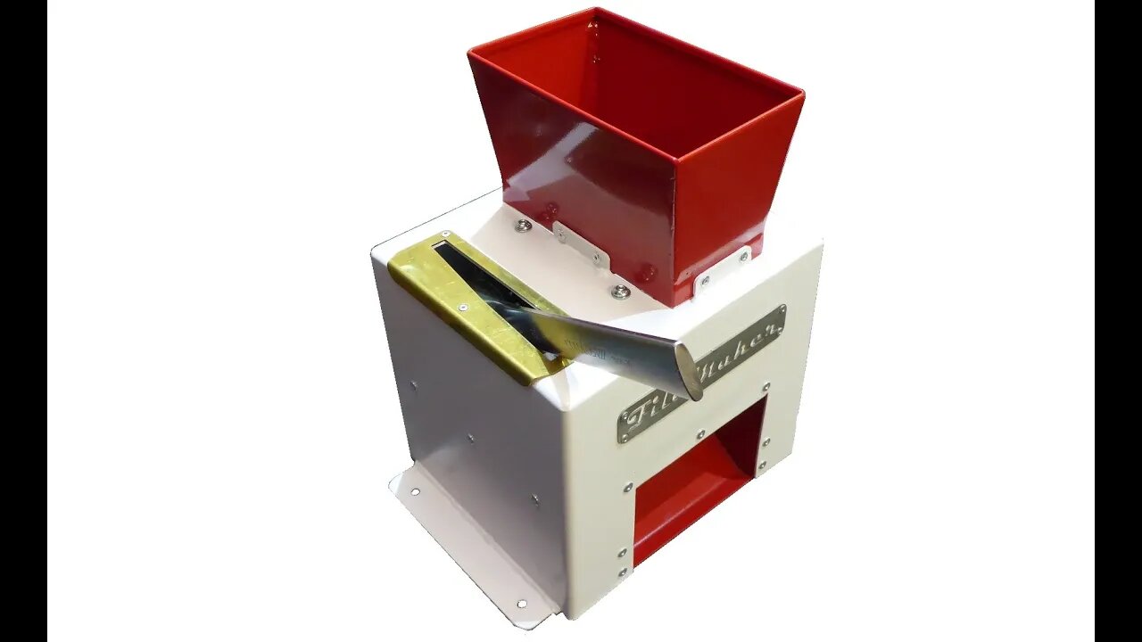 Testing hand driven shredder on mobile phone.