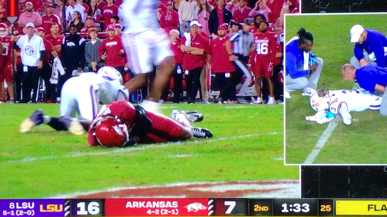 Razorbacks #5 Tyrone Broden gets drilled over the middle.