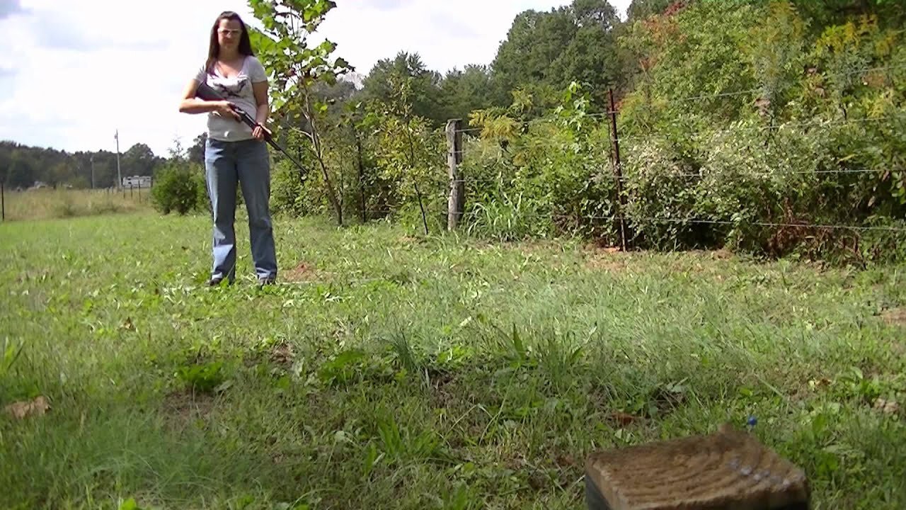 Lisa shooting the head of a stick pin