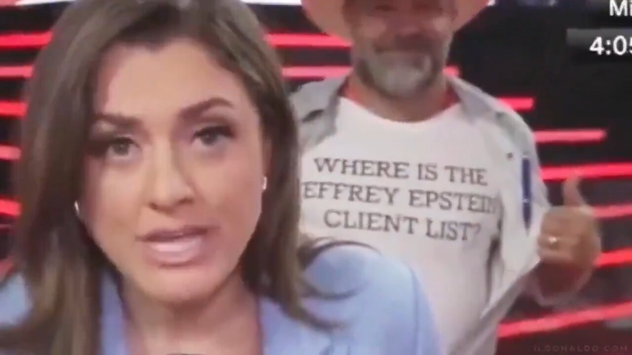 A man wearing shirt that says “WHERE IS THE JEFFREY EPSTEIN CLIENT LIST” in CNN news report