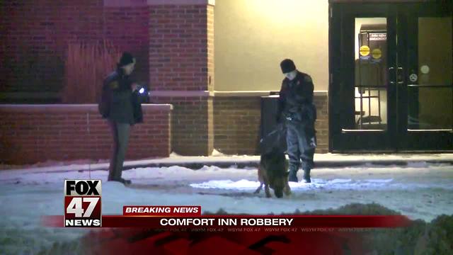 Police looking for man who robbed hotel at gunpoint