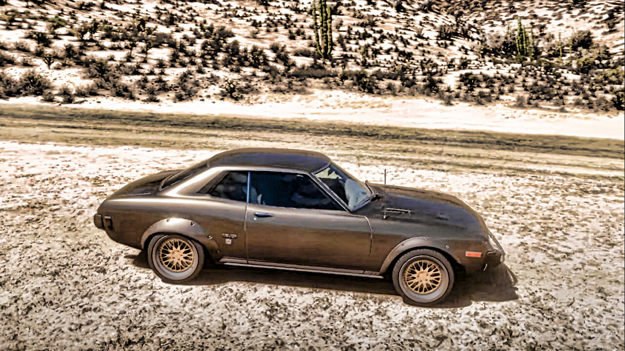 1974 Toyota Celica GT. I become ultra serious, then stop doing that. Fun in an old rear drive car.