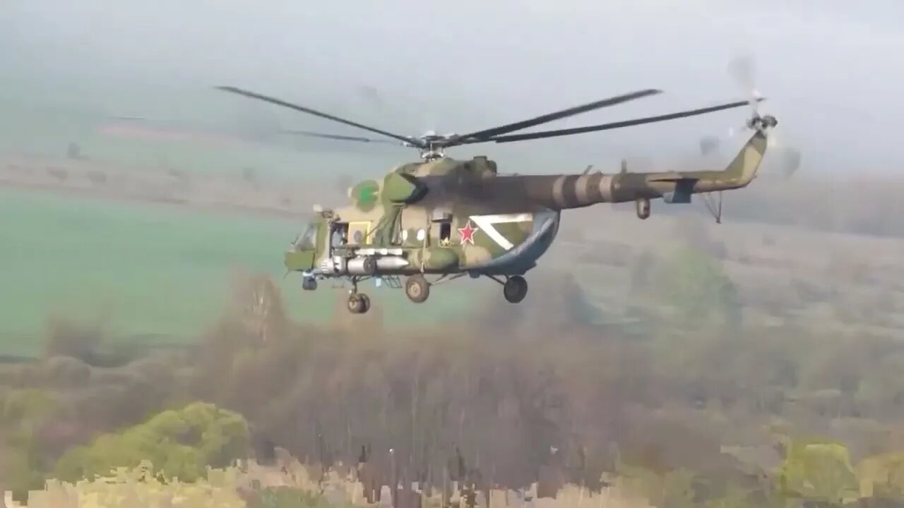 Combat helicopters escort Russian military convoys