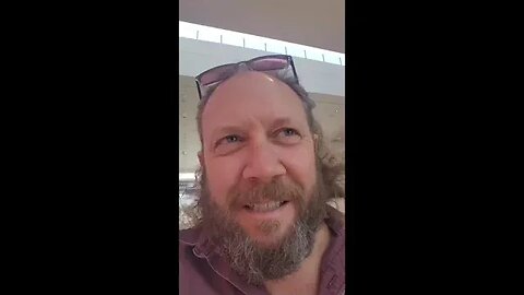 Johnny Ray Reed Shopping With a Possum