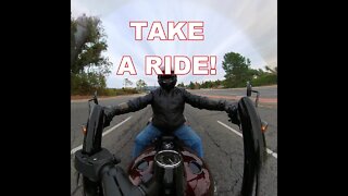You're behind bars. 360 Degree Experience Riding a Harley Road King
