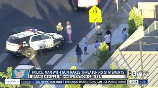 Man walks into rehab center with gun