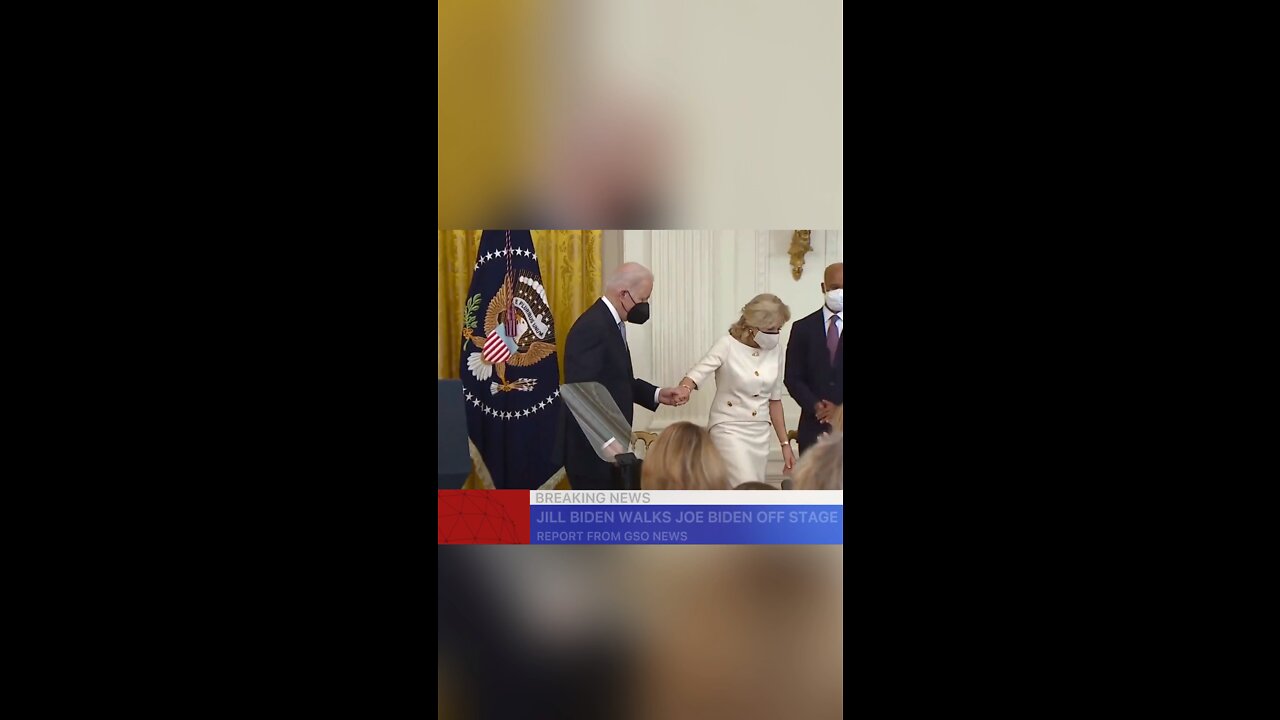 Jill Biden holds Joe Biden’s hand and walks him off stage